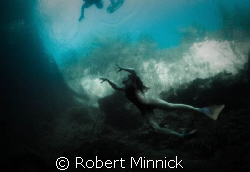 Swimmer beware!  There be monsters here... by Robert Minnick 